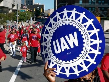 Auto workers vote overwhelmingly to let union leaders call strikes against companies