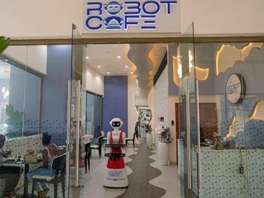 Robot waiters in Kenya create a buzz. But there are concerns about what it means for human labor